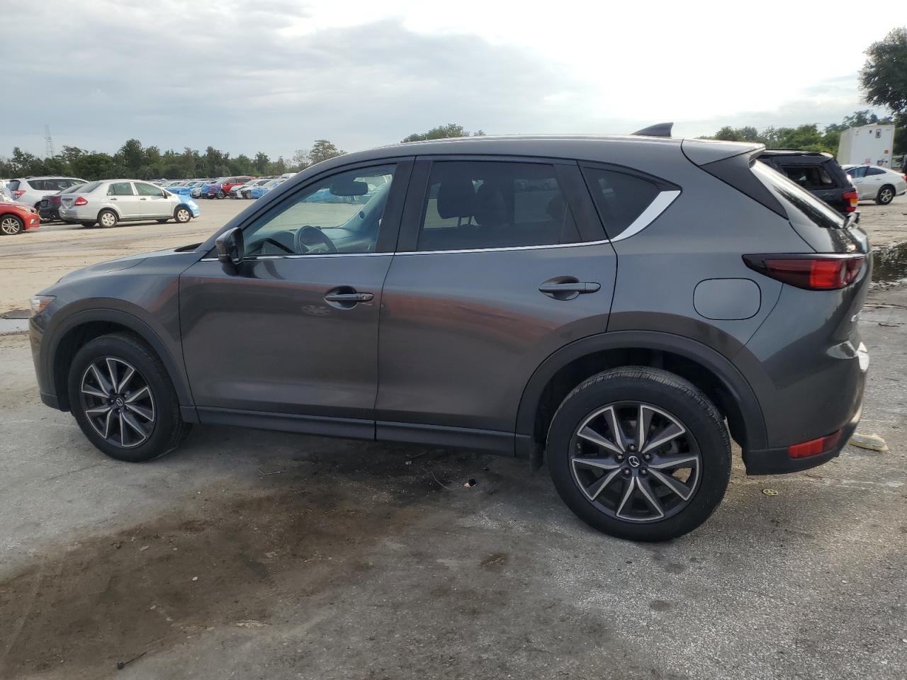 2018 Mazda CX-5 VIN JM3KFACM4J1430659 Copart auction photo, side damage thumbnail 2