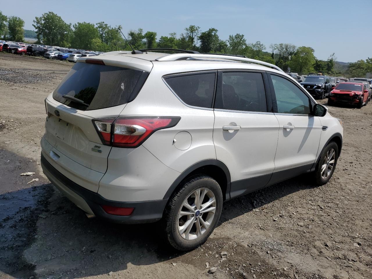 2017 Ford Escape VIN 1FMCU9GD6HUA74571 Copart auction photo, rear end / minor dent/scratches damage thumbnail 3