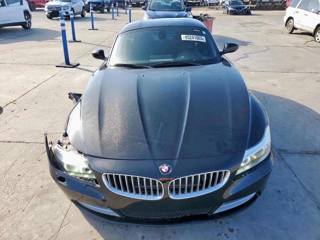 2014 BMW Z4 VIN WBALM7C51EE386386 Copart auction photo, front end damage thumbnail 5