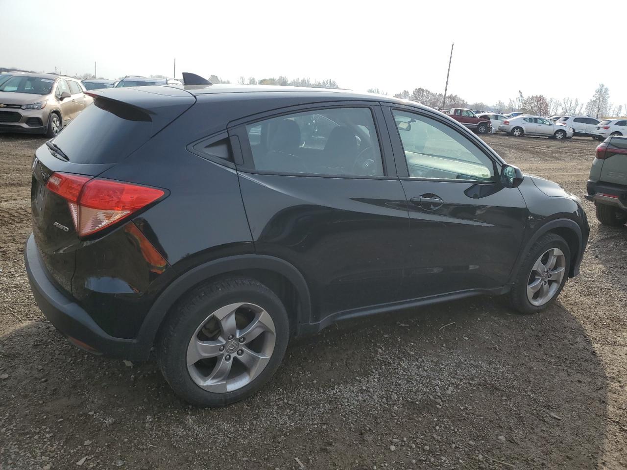 2018 Honda HR-V VIN 3CZRU6H33JG728688 Copart auction photo, side / mechanical damage thumbnail 3
