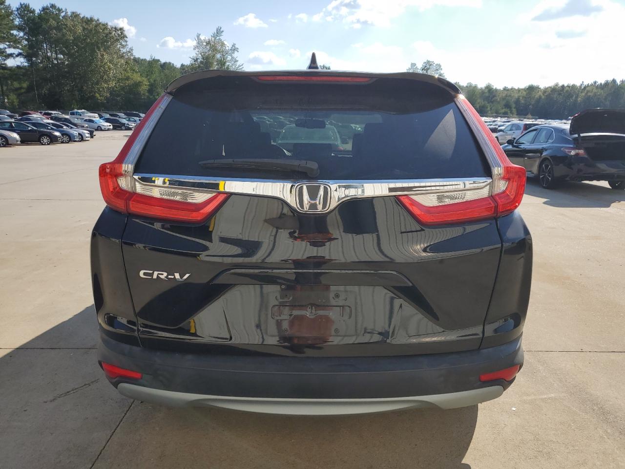 2018 Honda CR-V VIN 7FARW1H8XJE031379 Copart auction photo, side / front end damage thumbnail 6