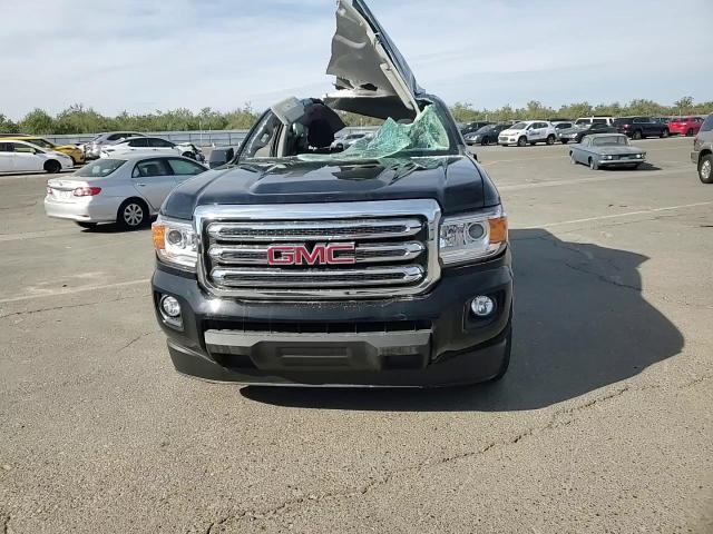 2018 GMC Canyon VIN 1GTG5CENXJ1133897 Copart auction photo, rollover damage thumbnail 10