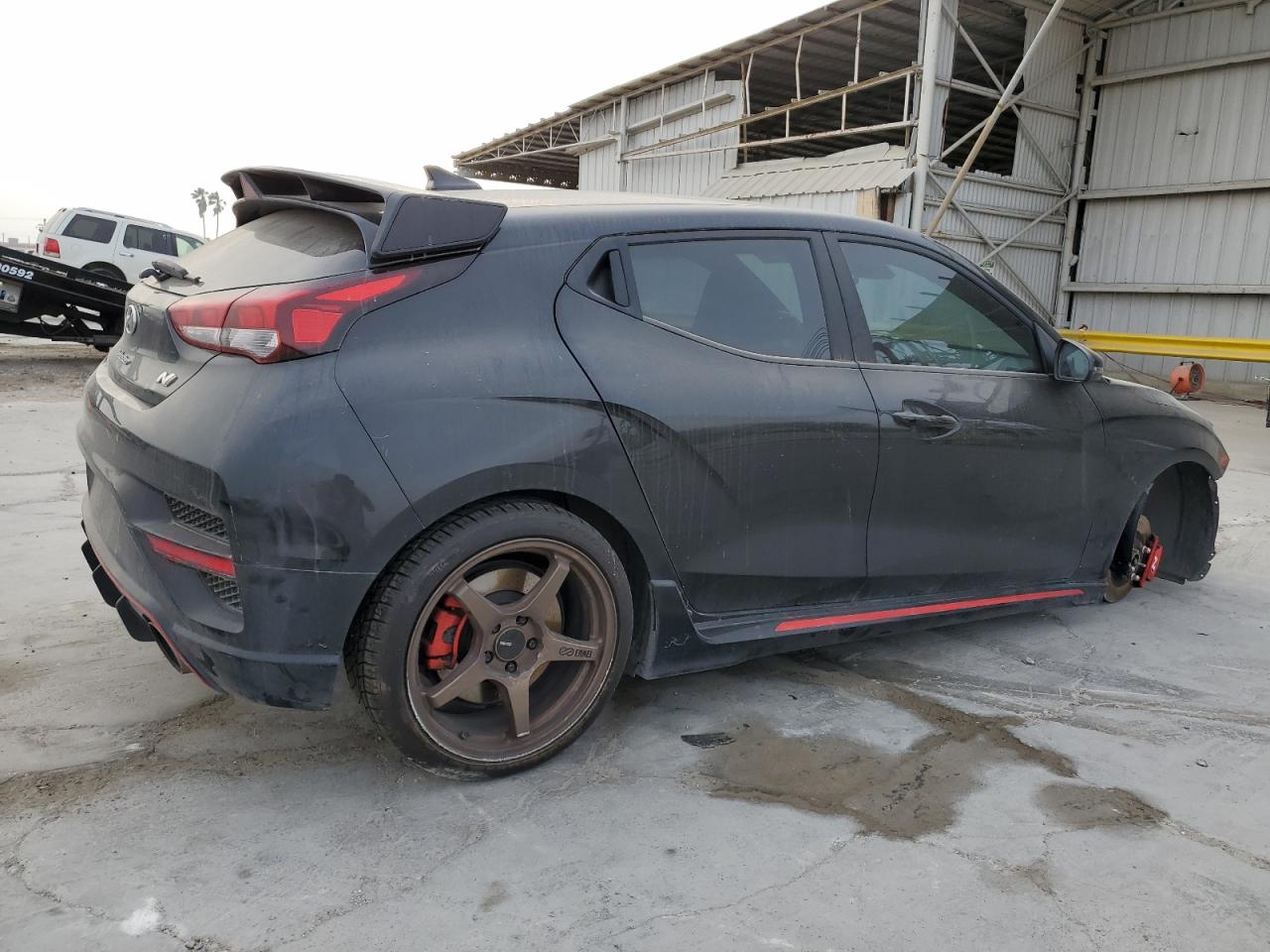 2022 Hyundai Veloster VIN KMHT36AH7NU013979 Copart auction photo, side / front end damage thumbnail 3