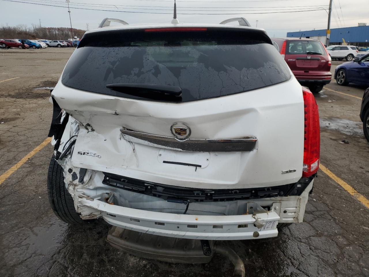 2012 Cadillac SRX VIN 3GYFNDE38CS634511 Copart auction photo, rear end / front end damage thumbnail 6