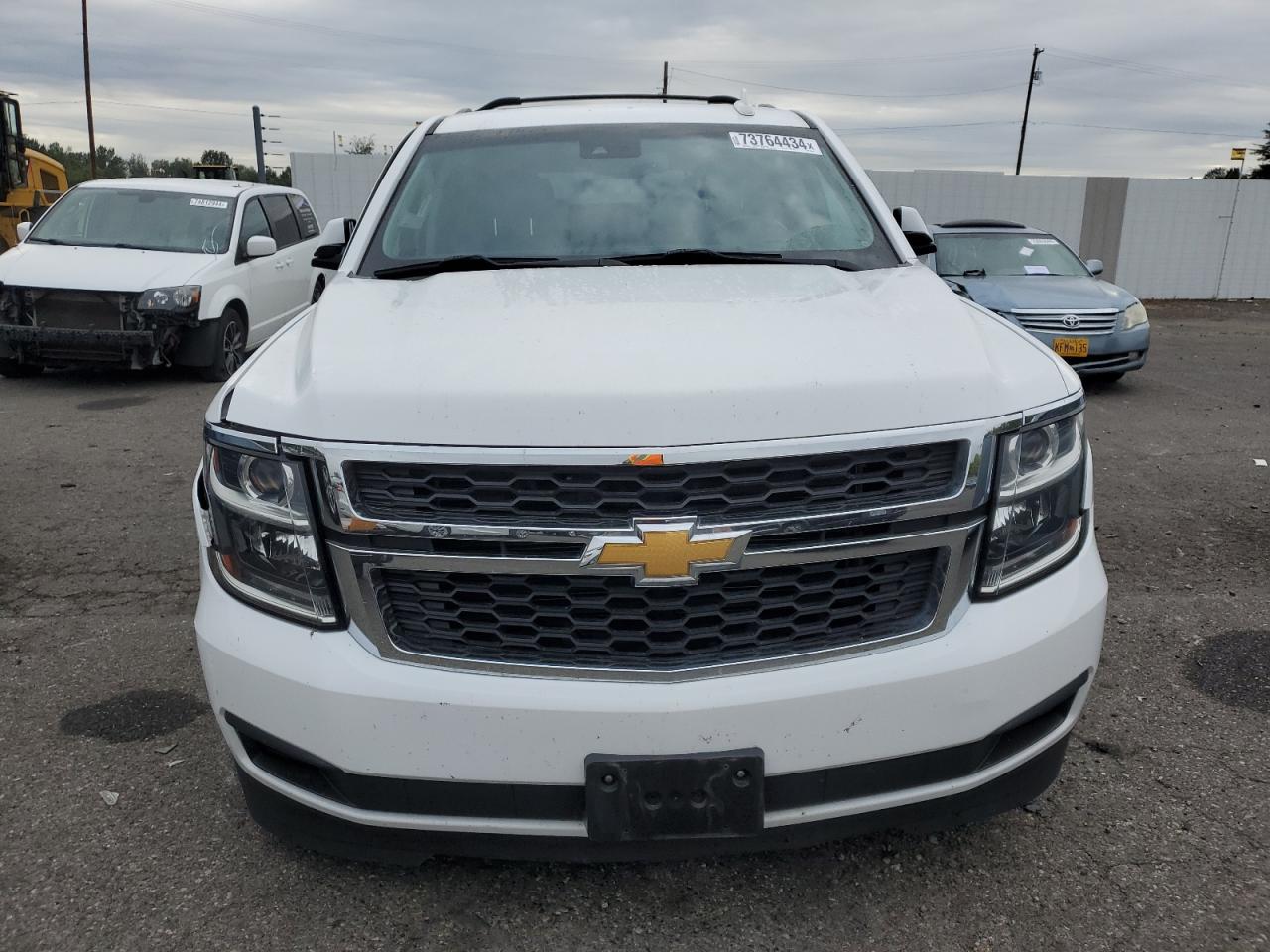 2018 Chevrolet Tahoe VIN 1GNSKBKCXJR150532 Copart auction photo, side / undercarriage damage thumbnail 5