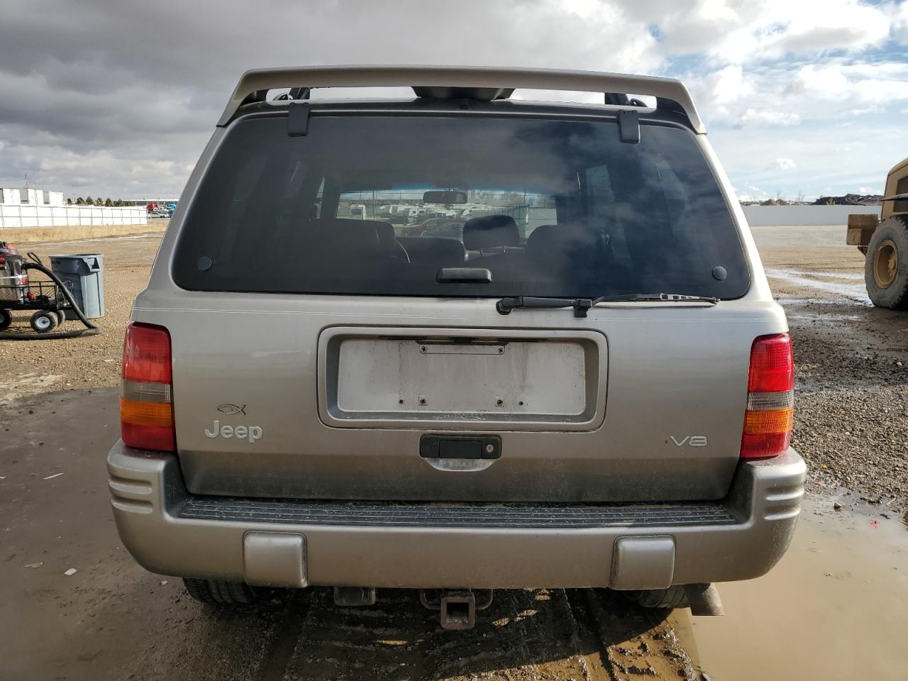 1997 Jeep Grand Cherokee VIN 1J4GZ78Y0VC556381 Copart auction photo, side / undercarriage damage thumbnail 6