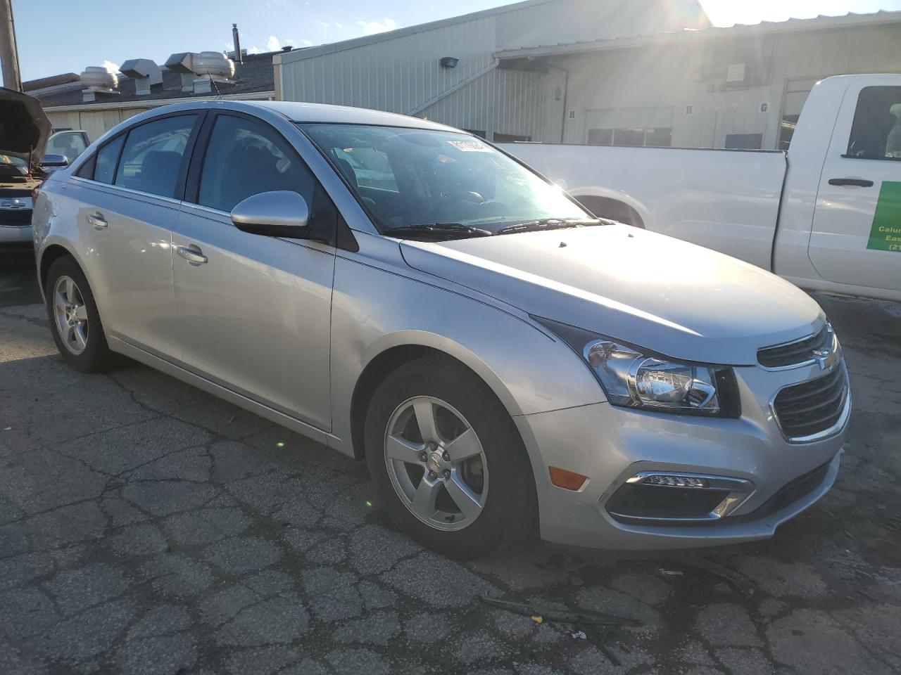 2015 Chevrolet Cruze VIN 1G1PC5SB2F7132297 Copart auction photo, front end / side damage thumbnail 4