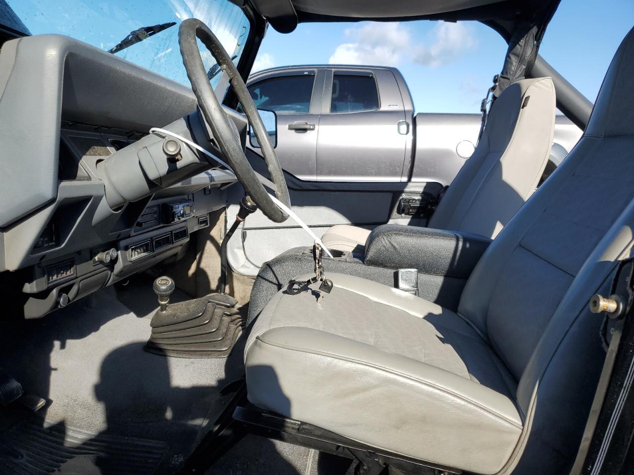 1989 Jeep Wrangler VIN 2J4FY19E9KJ162797 Copart auction photo, rear end damage thumbnail 7