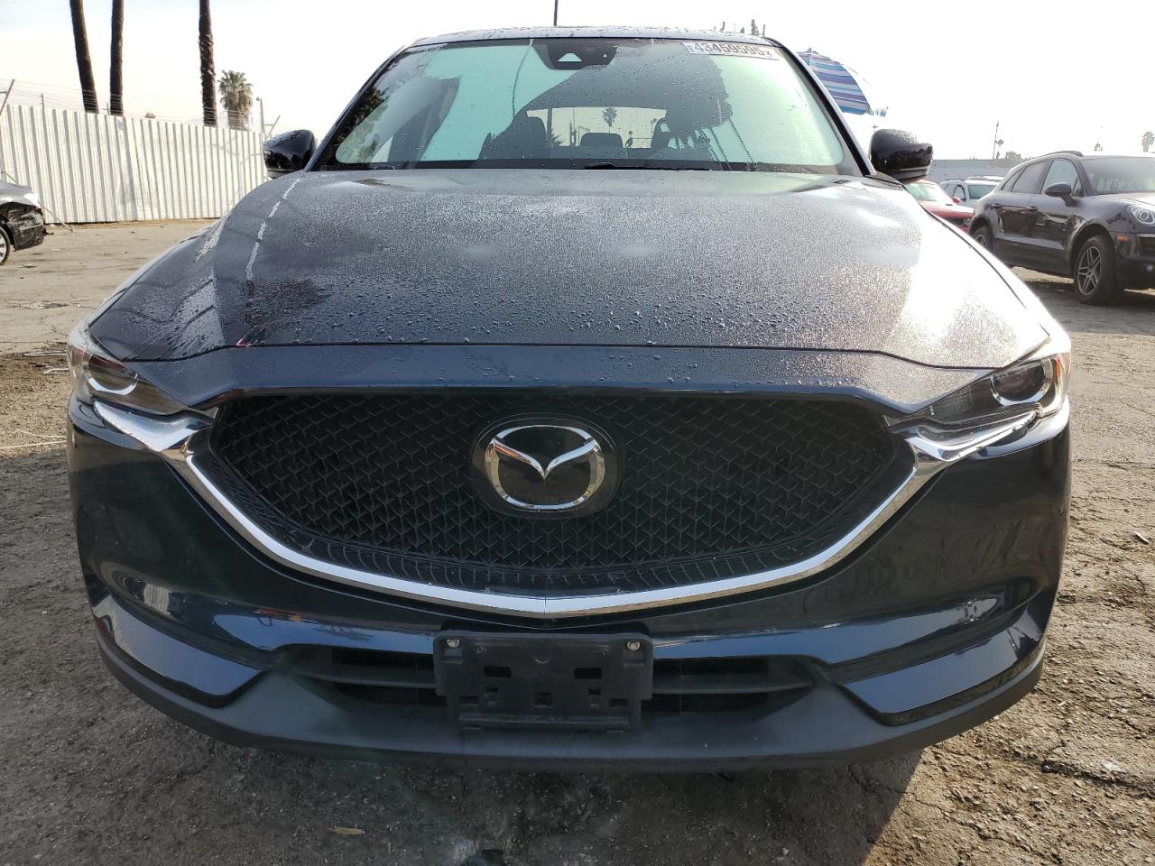 2020 Mazda CX-5 VIN JM3KFACM4L0860328 Copart auction photo, side / minor dent/scratches damage thumbnail 5