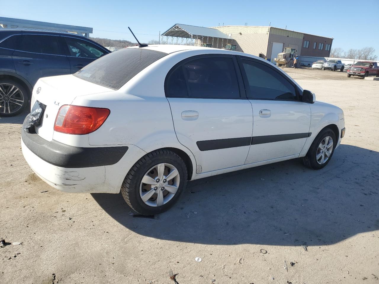 2009 KIA Rio VIN KNADE223296496058 Copart auction photo, front end damage thumbnail 3