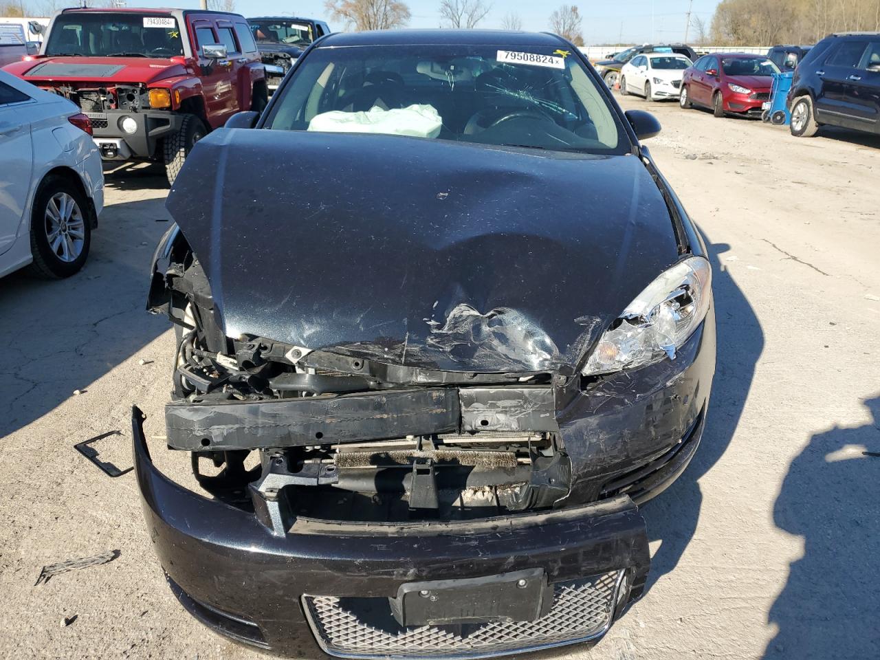 2012 Chevrolet Impala VIN 2G1WB5E32C1182970 Copart auction photo, front end damage thumbnail 5
