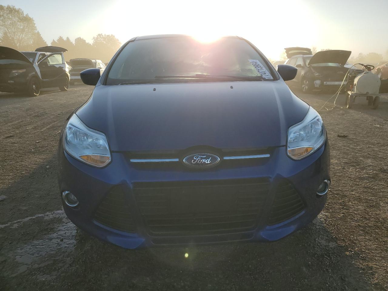 2012 Ford Focus VIN 1FAHP3K2XCL299262 Copart auction photo, hail / rear end damage thumbnail 5