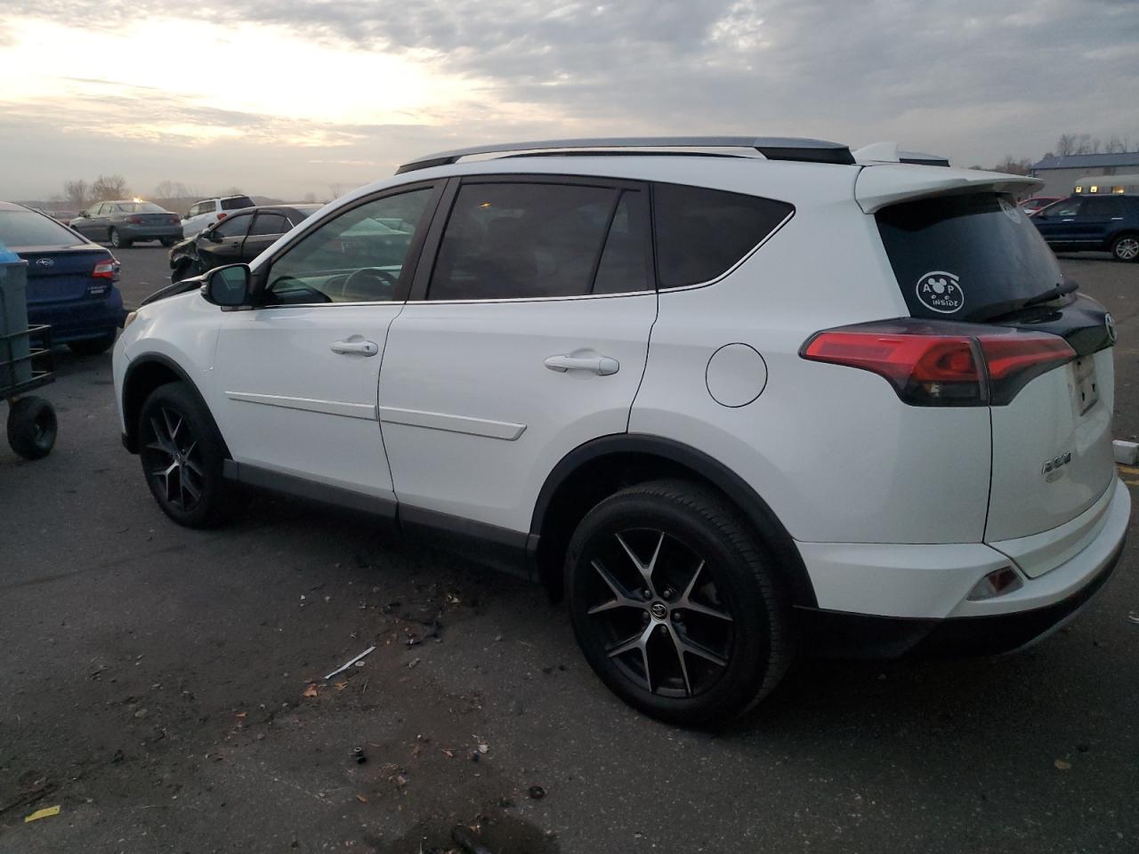 2017 Toyota RAV 4 VIN 2T3JFREV1HW623887 Copart auction photo, front end damage thumbnail 2