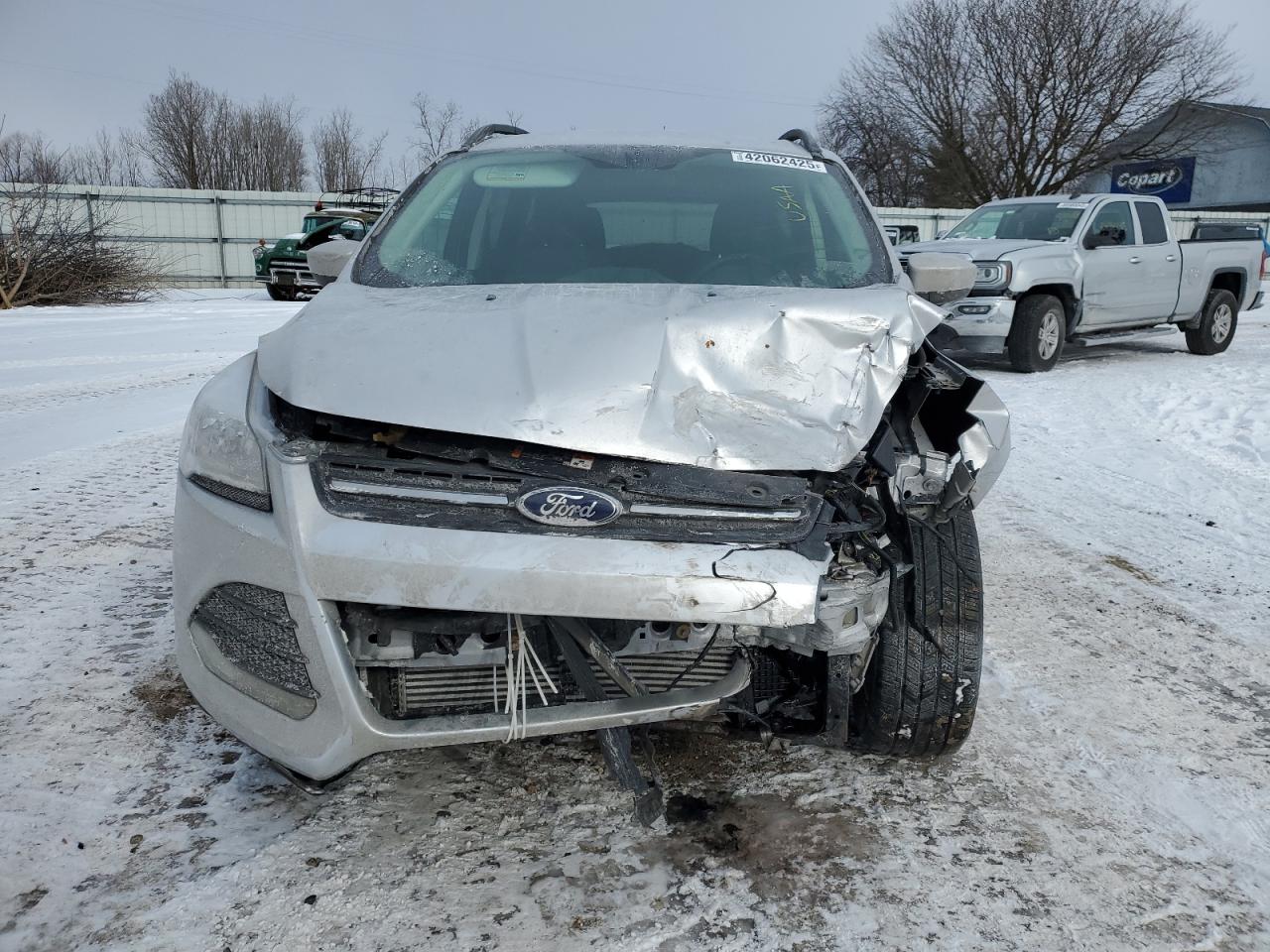 2016 Ford Escape VIN 1FMCU0GX4GUB94891 Copart auction photo, front end / side damage thumbnail 5
