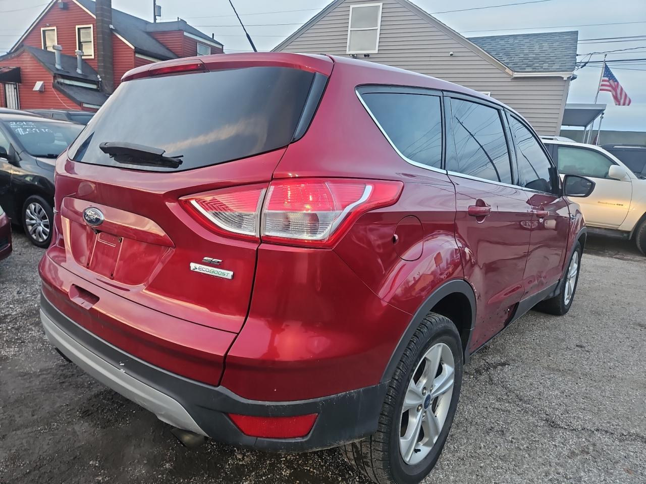 2014 Ford Escape VIN 1FMCU0GX1EUA49921 Copart auction photo, normal wear / minor dent/scratches damage thumbnail 4