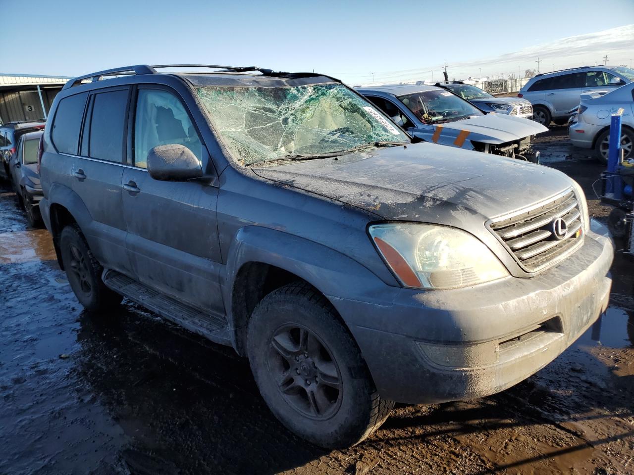 2004 Lexus GX VIN JTJBT20X540068340 Copart auction photo, all over damage thumbnail 4