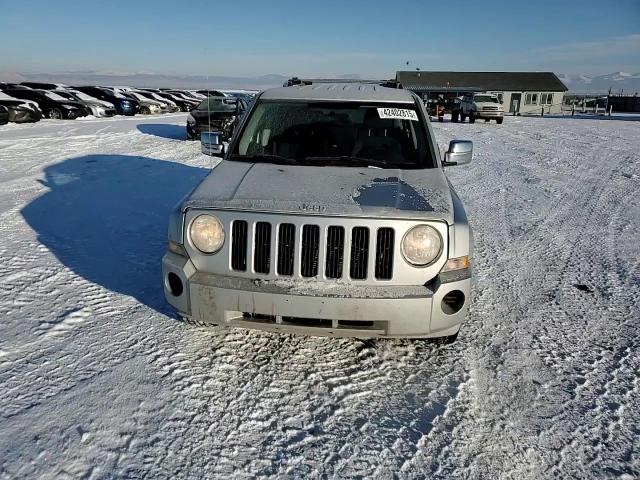 2010 Jeep Liberty (Patriot) VIN 1J4NT2GA8AD649878 Copart auction photo, rear end / undercarriage damage thumbnail 11