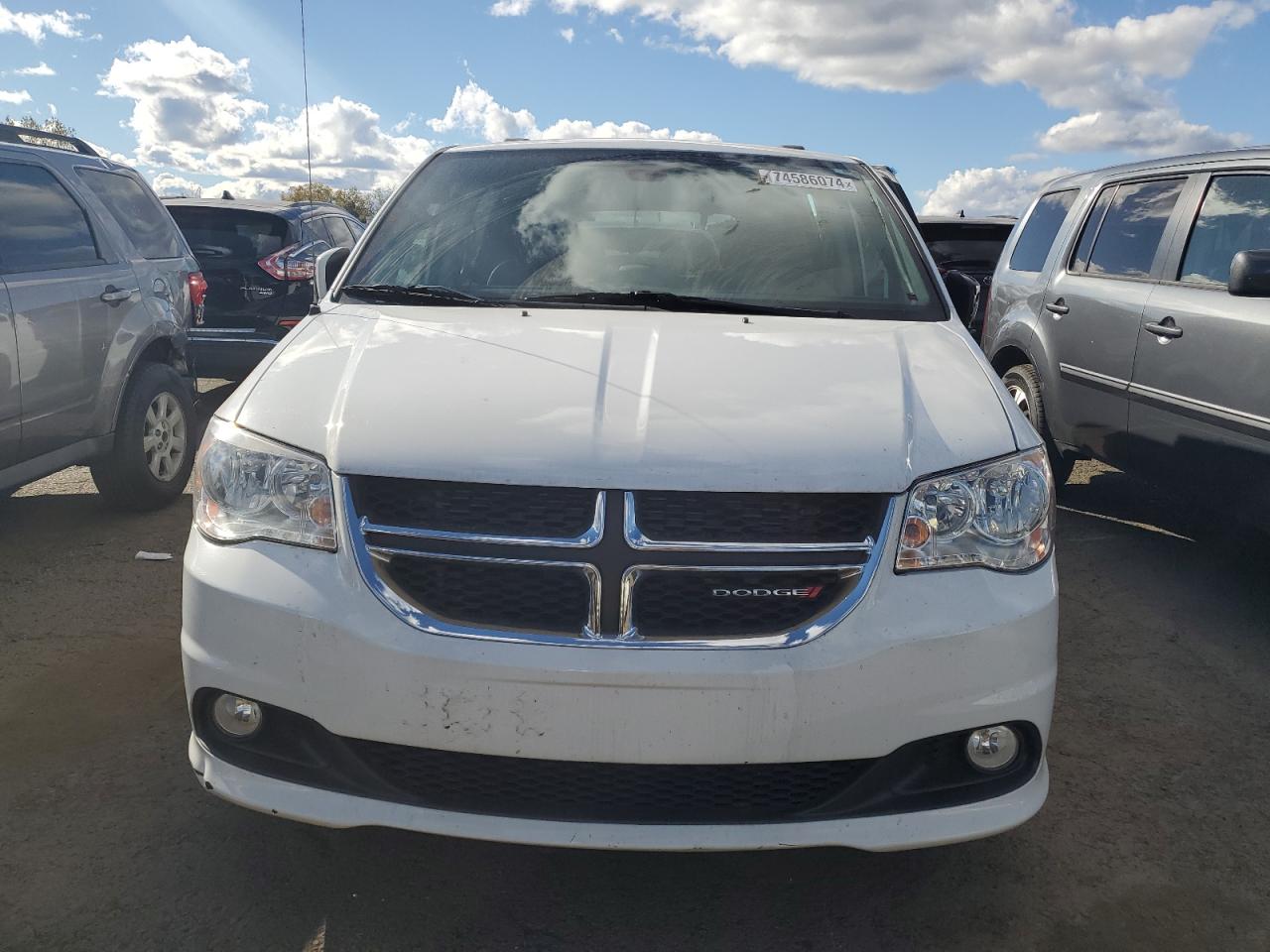 2019 Dodge Caravan VIN 2C4RDGCGXKR790722 Copart auction photo, side / minor dent/scratches damage thumbnail 5