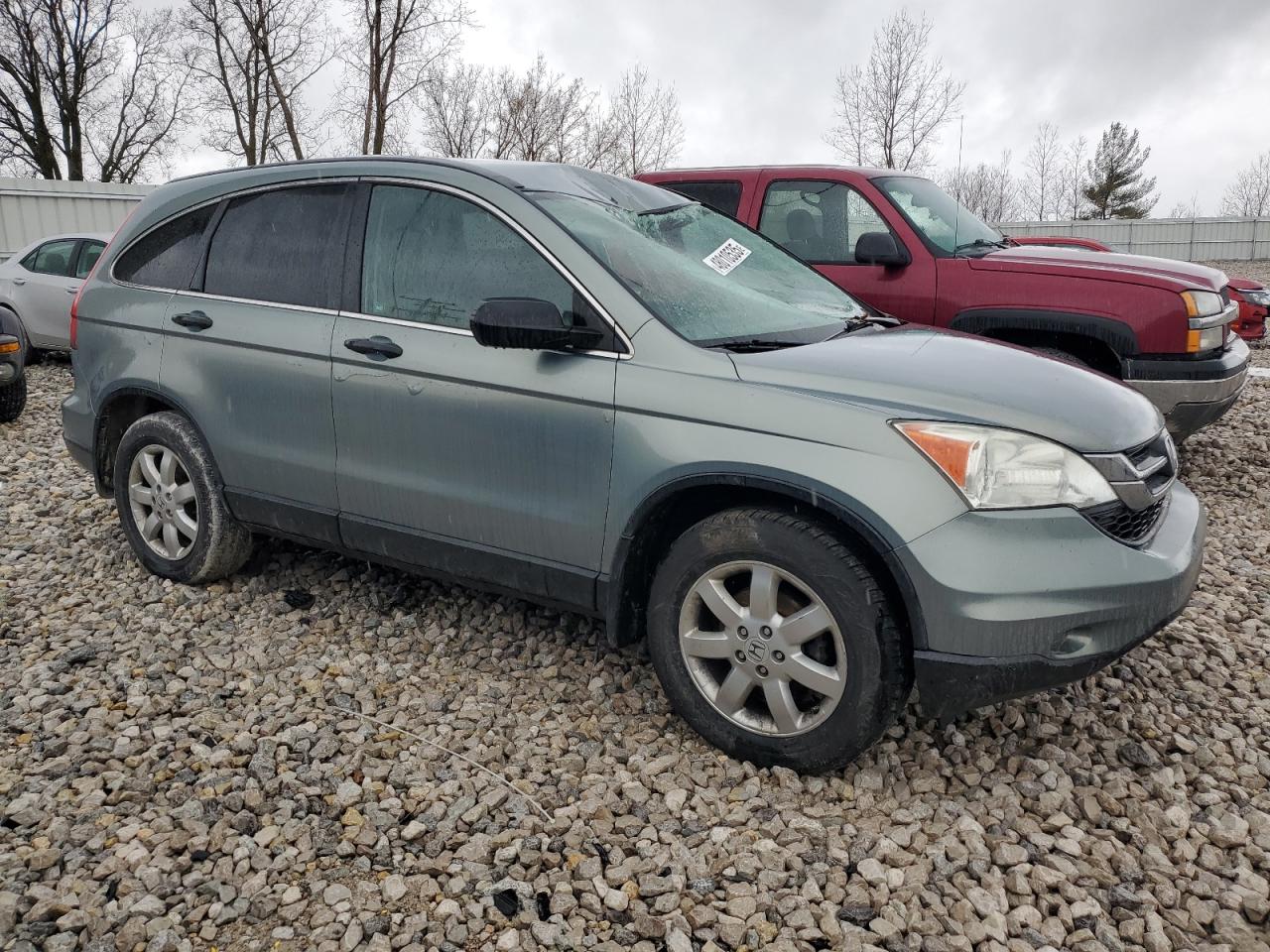 2011 Honda CR-V VIN 5J6RE4H31BL804365 Copart auction photo, top/roof damage thumbnail 4
