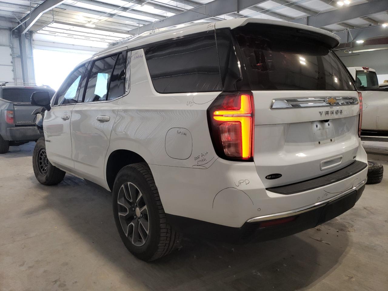 2022 Chevrolet Tahoe VIN 1GNSKNKD2NR121607 Copart auction photo, front end / hail damage thumbnail 2