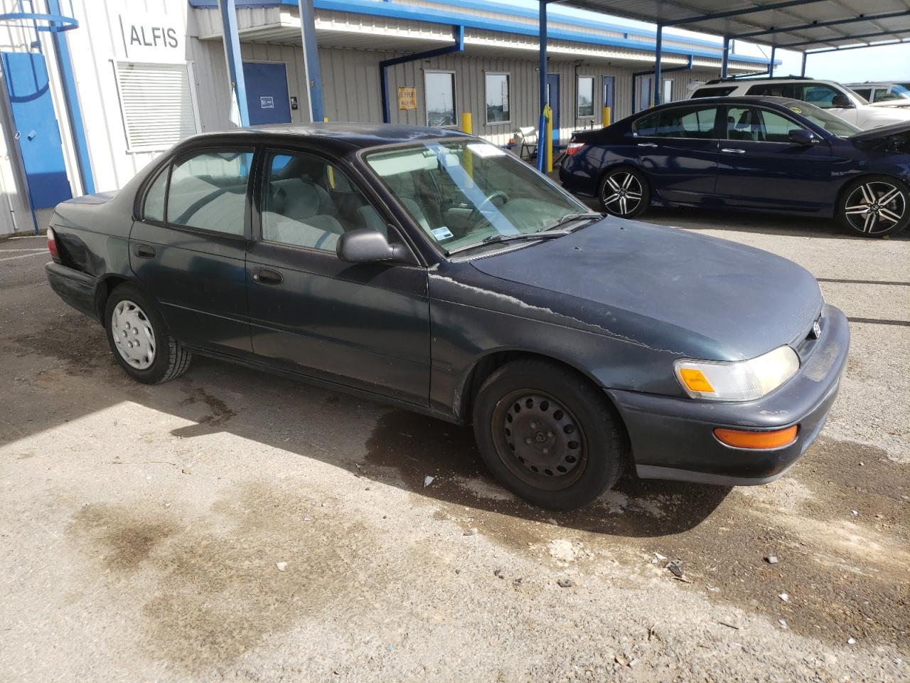 1997 Toyota Corolla VIN 1NXBA02E5VZ664241 Copart auction photo, rear end / front end damage thumbnail 4