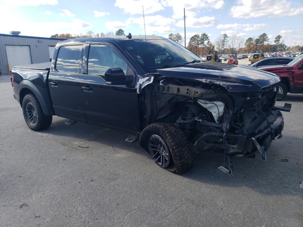 2020 Ford F-150 VIN 1FTFW1RG6LFB97899 Copart auction photo, front end / undercarriage damage thumbnail 4