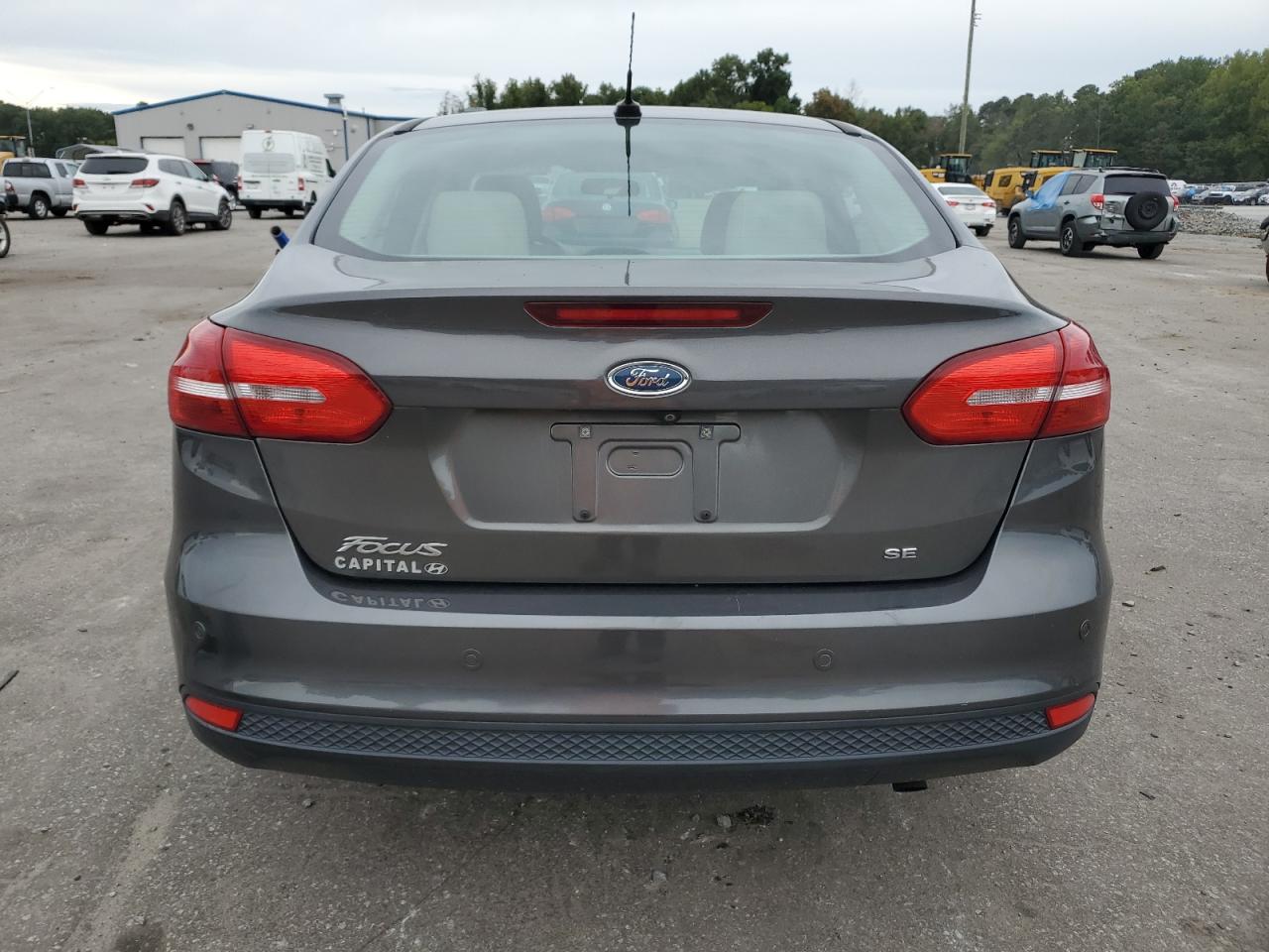 2015 Ford Focus VIN 1FADP3F20FL253257 Copart auction photo, front end / side damage thumbnail 6