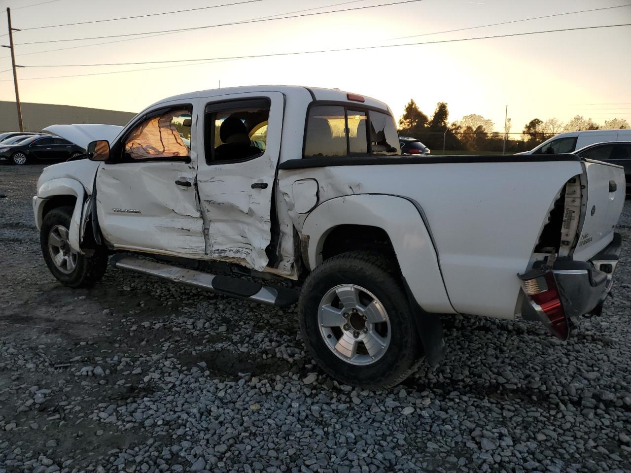 2010 Toyota Tacoma VIN 5TELU4ENXAZ694002 Copart auction photo, side damage thumbnail 2