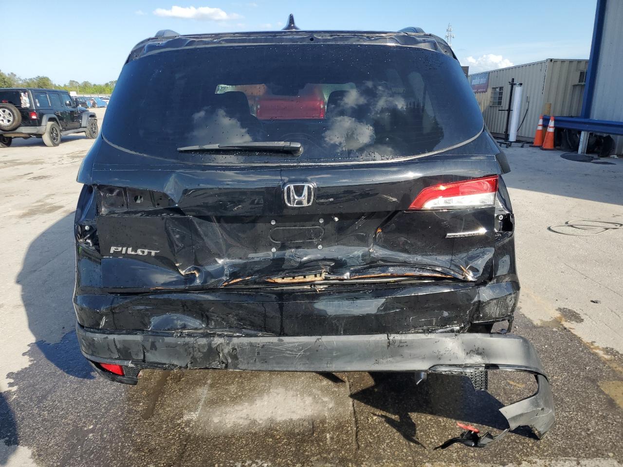 2021 Honda Pilot VIN 5FNYF5H29MB022154 Copart auction photo, rear end / partial repair damage thumbnail 6