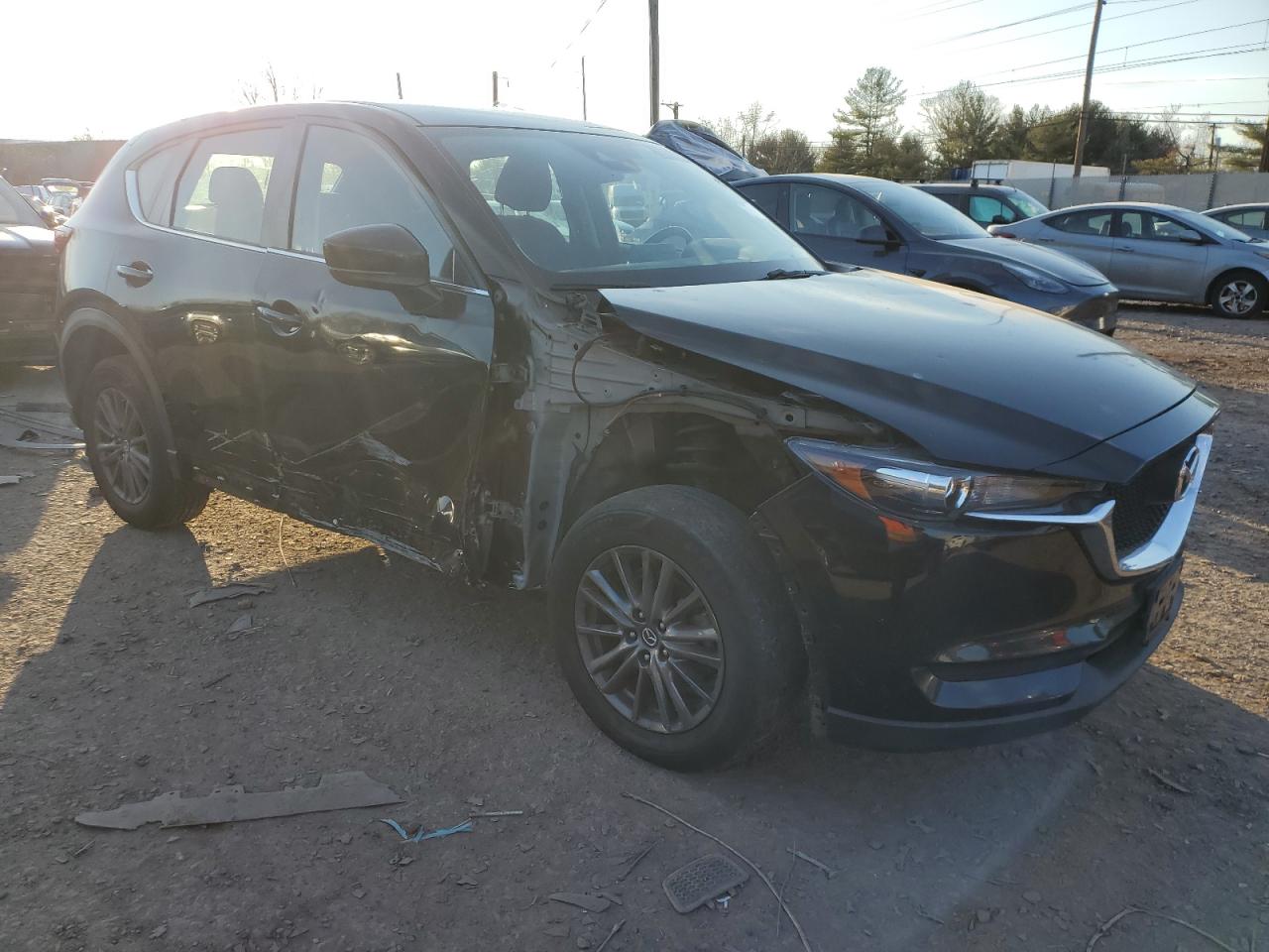 2019 Mazda CX-5 VIN JM3KFBBM5K0524242 Copart auction photo, front end / side damage thumbnail 4