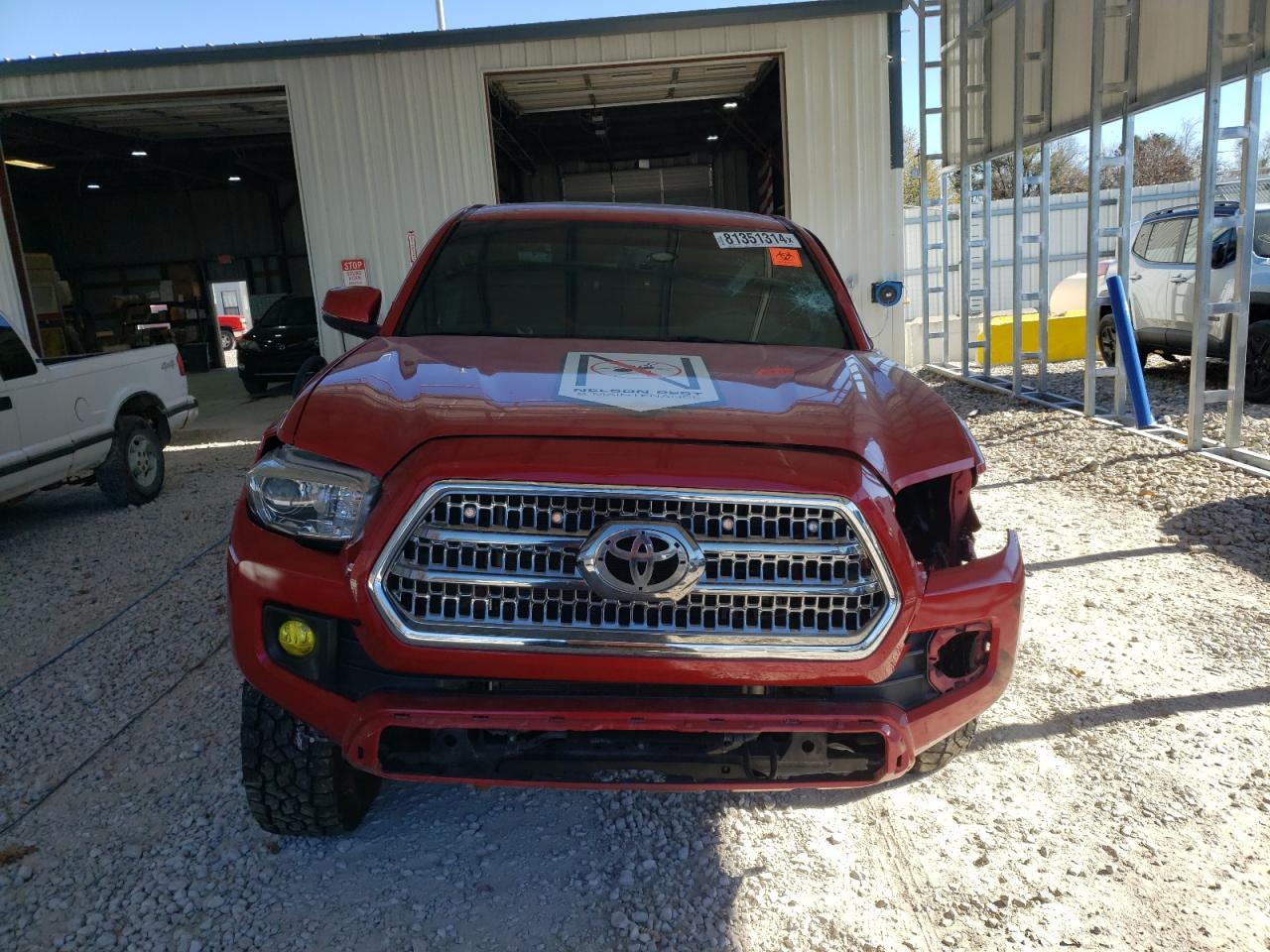 2016 Toyota Tacoma VIN 3TMDZ5BN4GM009918 Copart auction photo, front end / side damage thumbnail 5