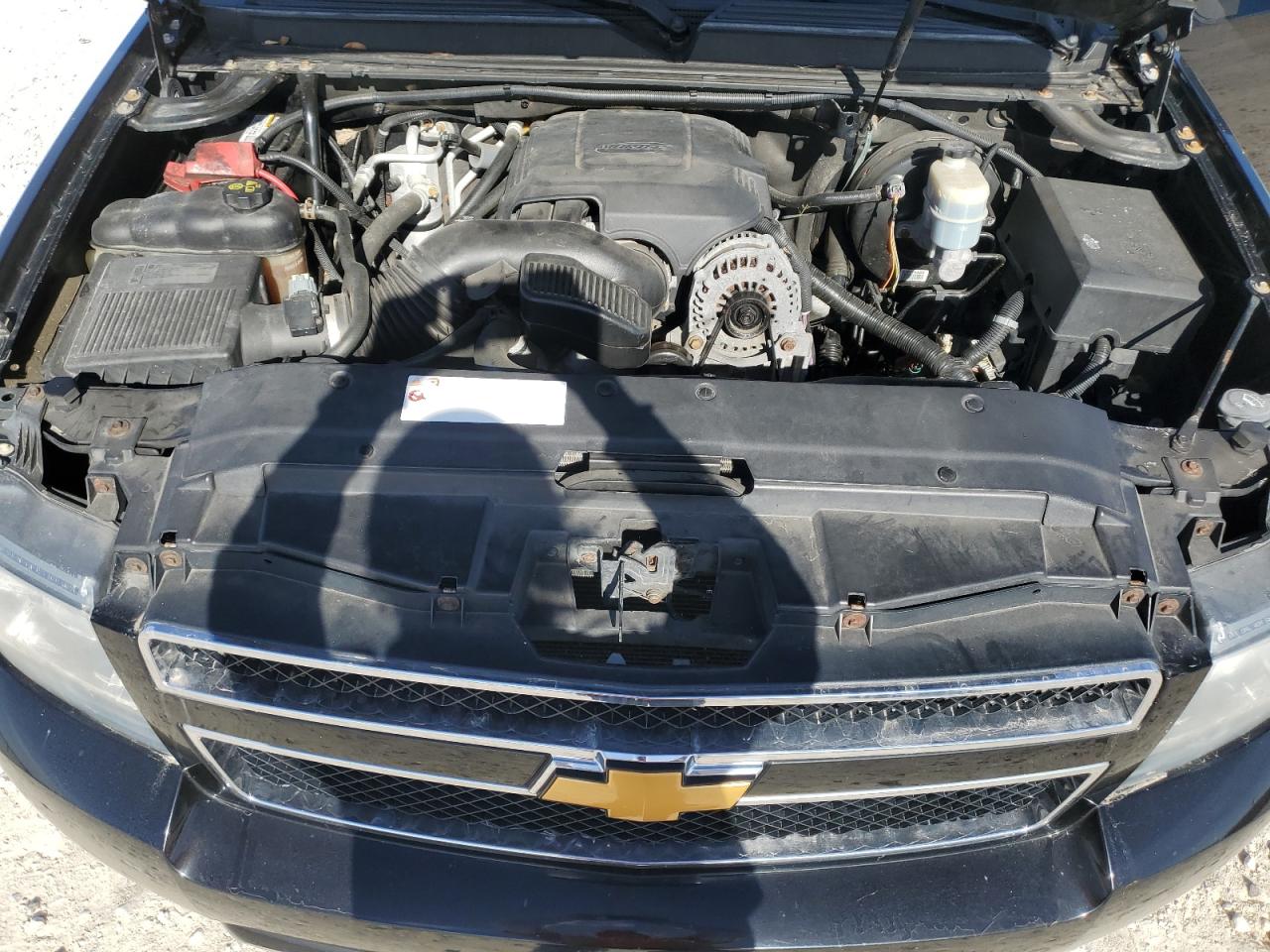 2012 Chevrolet Suburban VIN 1GNSKJE7XCR166063 Copart auction photo, vandalism damage thumbnail 12