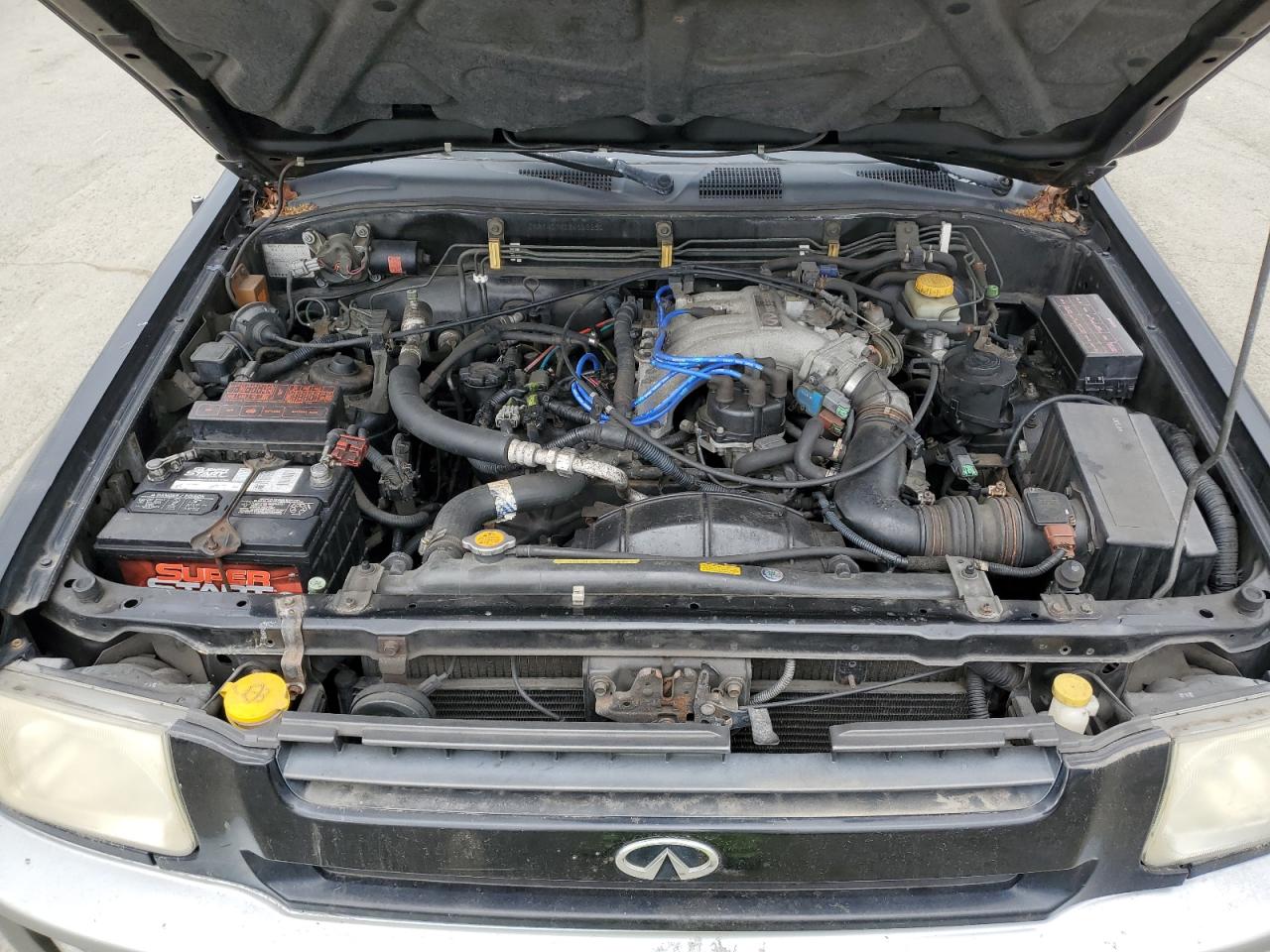 1999 Infiniti QX4 VIN JNRAR07YXXW063250 Copart auction photo, vandalism / undercarriage damage thumbnail 12