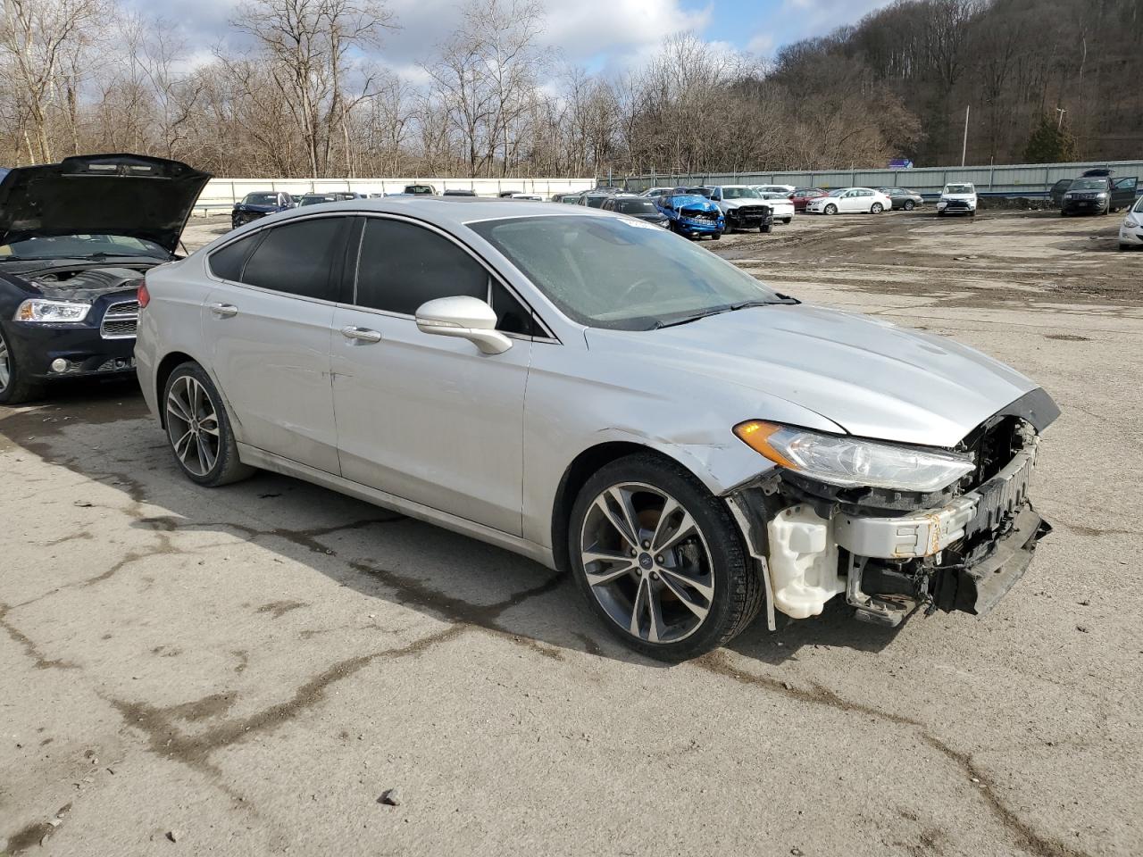 2019 Ford Fusion VIN 3FA6P0LU5KR109258 Copart auction photo, front end / side damage thumbnail 4