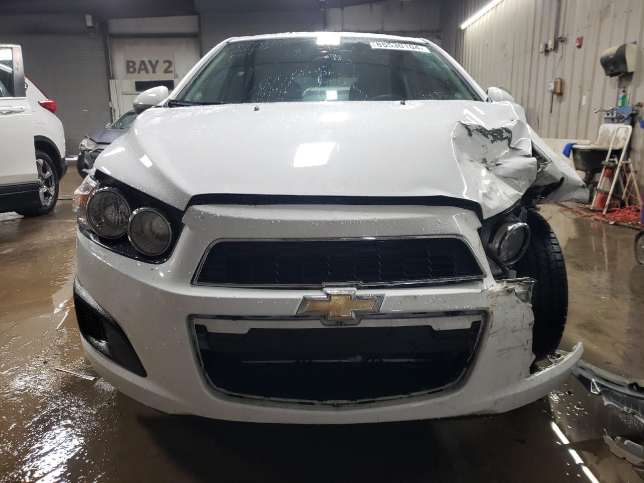 2014 Chevrolet Sonic VIN 1G1JC6SH6E4239708 Copart auction photo, front end damage thumbnail 5