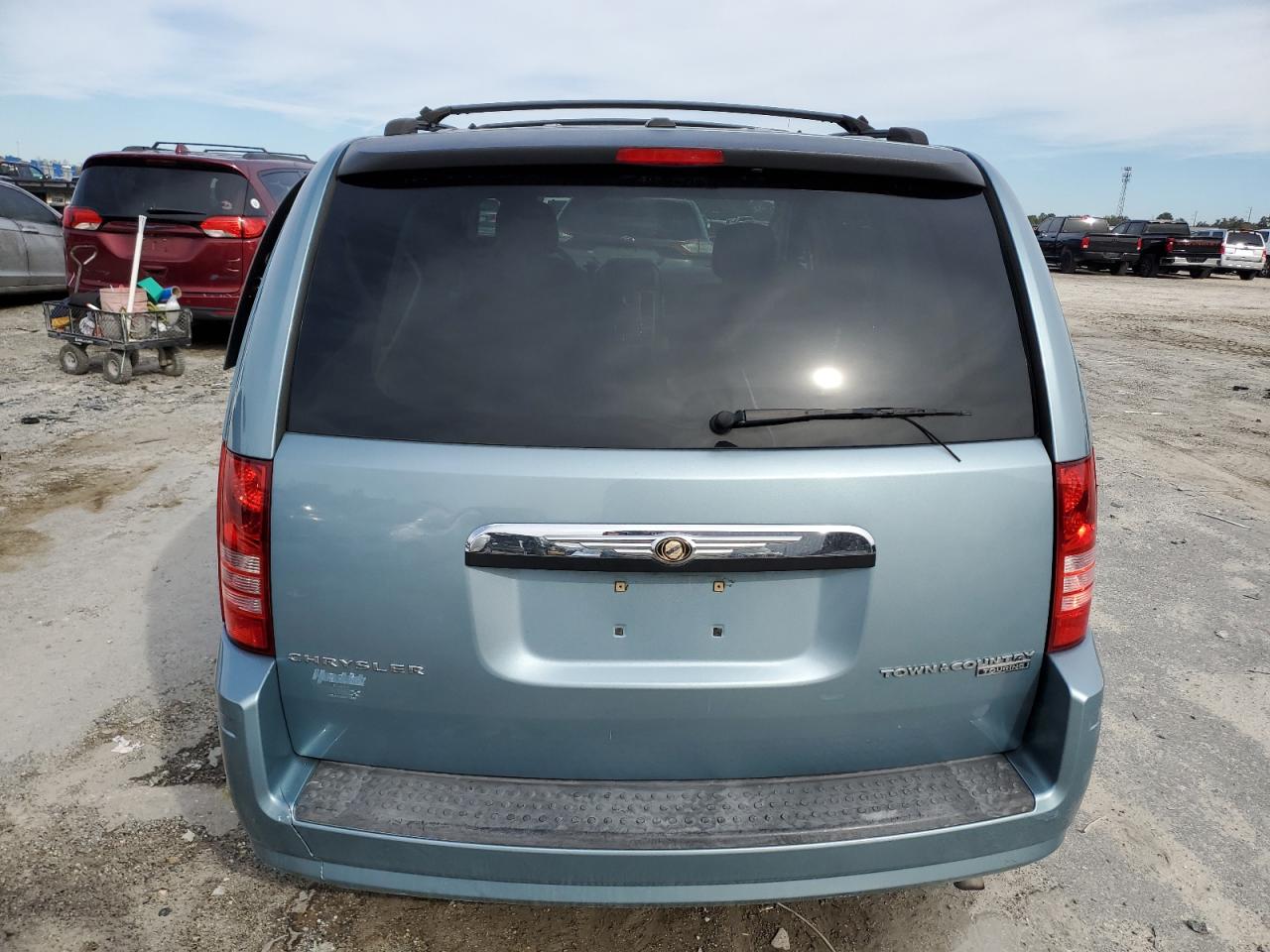 2010 Chrysler Town & Country VIN 2A4RR5D15AR387076 Copart auction photo, side / rear end damage thumbnail 6
