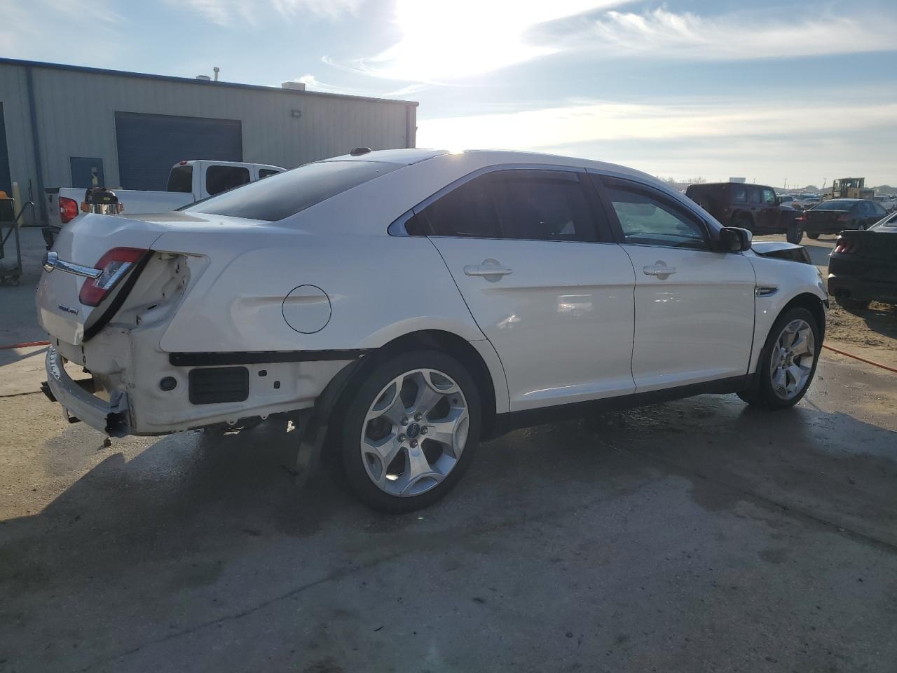 2012 Ford Taurus VIN 1FAHP2HW7CG123203 Copart auction photo, front end / rear end damage thumbnail 3