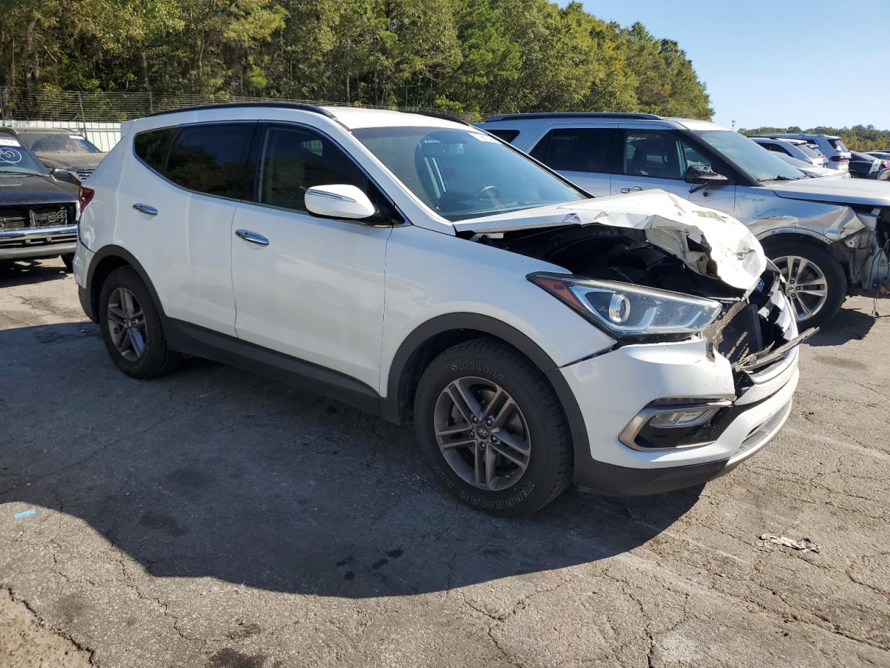 2017 Hyundai Santa Fe VIN 5NMZU3LB0HH031626 Copart auction photo, front end / rear end damage thumbnail 4