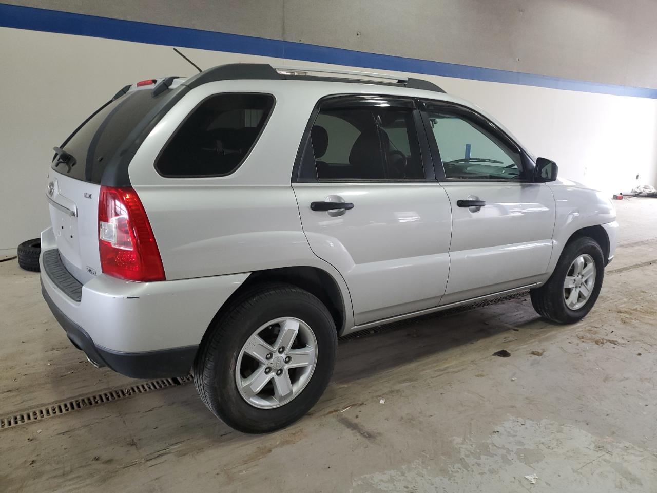 2009 KIA Sportage VIN KNDJE723X97554334 Copart auction photo, side / front end damage thumbnail 3