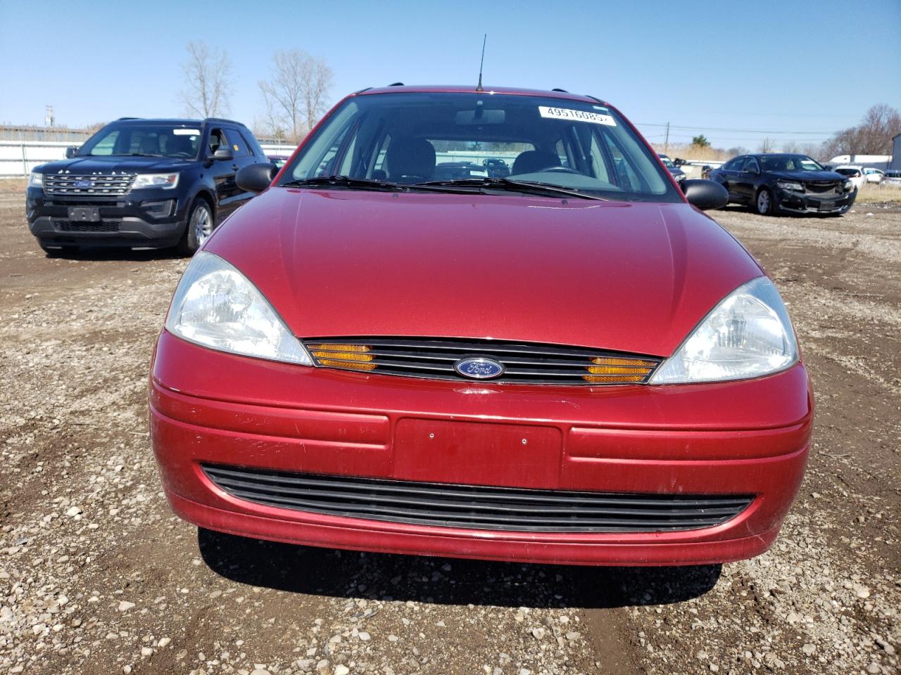 2001 Ford Focus VIN 1FAFP363X1W360857 Copart auction photo, undercarriage / minor dent/scratches damage thumbnail 5