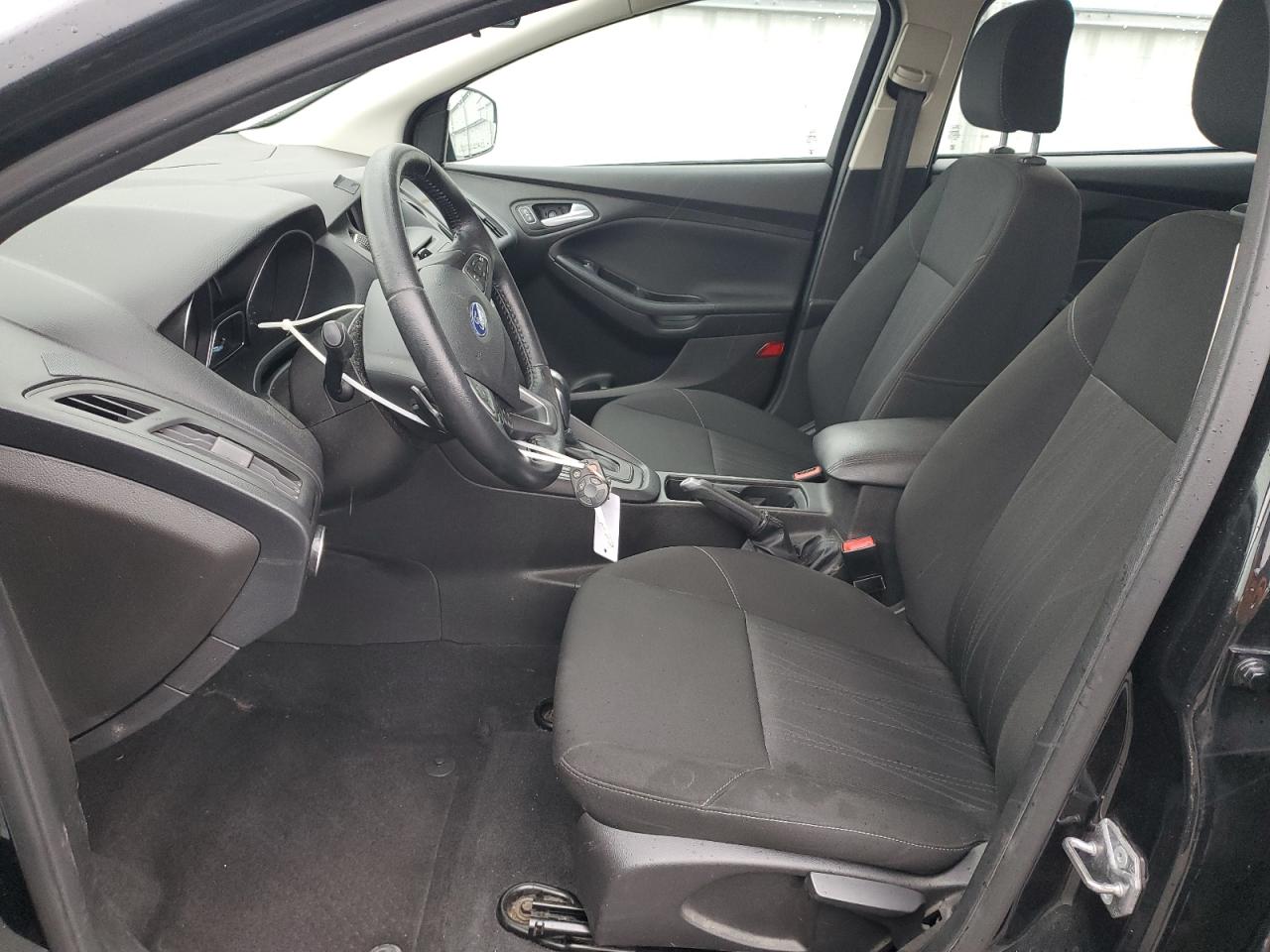 2015 Ford Focus VIN 1FADP3F25FL306115 Copart auction photo, front end / hail damage thumbnail 7
