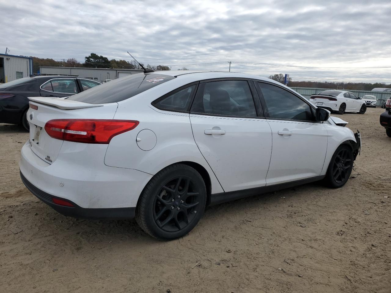 2015 Ford Focus VIN 1FADP3F23FL381962 Copart auction photo, front end / minor dent/scratches damage thumbnail 3