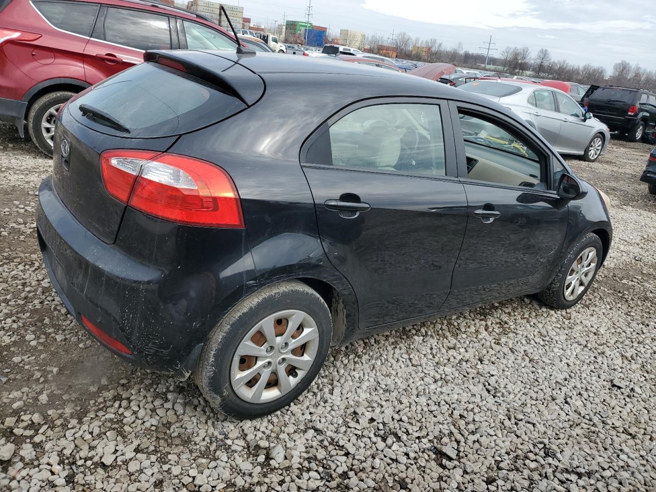 2012 KIA Rio VIN KNADM5A31C6023314 Copart auction photo, vandalism damage thumbnail 3