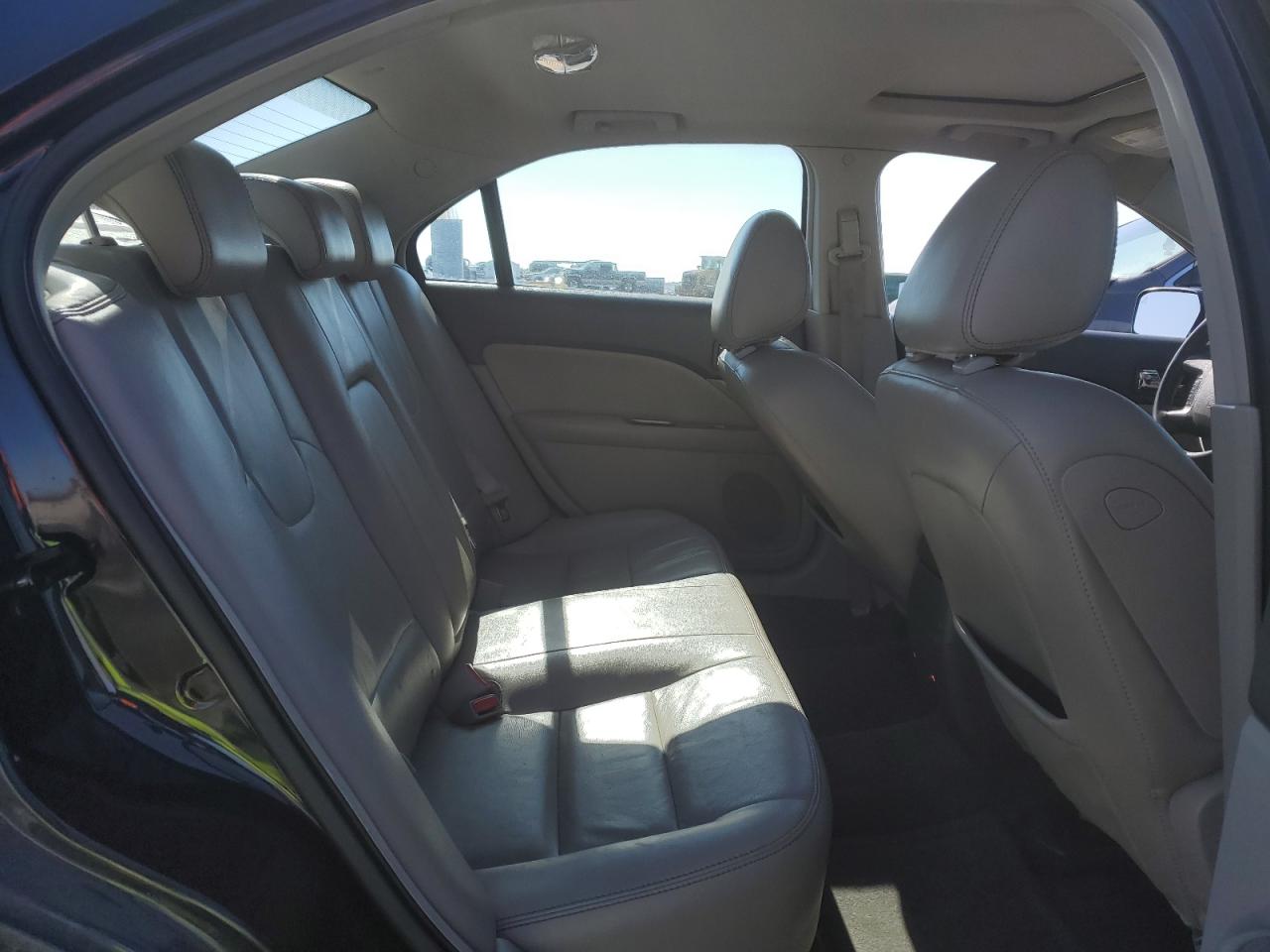 2010 Ford Fusion VIN 3FAHP0JG1AR173351 Copart auction photo, side / rear end damage thumbnail 10