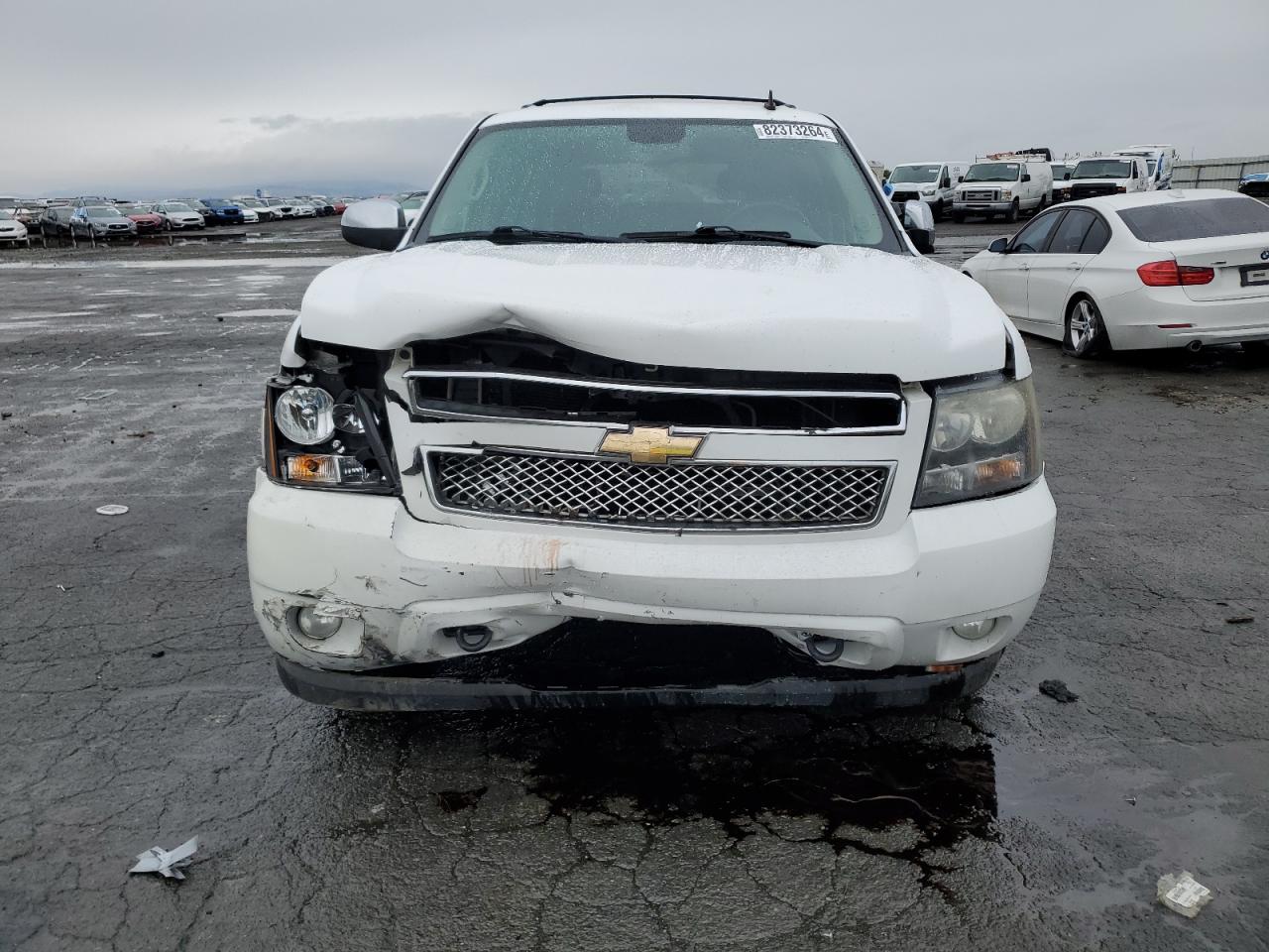 2010 Chevrolet Tahoe VIN 1GNUKCE04AR219599 Copart auction photo, front end / undercarriage damage thumbnail 5