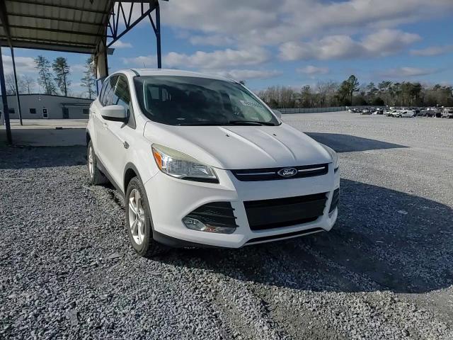 2016 Ford Escape VIN 1FMCU0G71GUA25993 Copart auction photo, side / minor dent/scratches damage thumbnail 11
