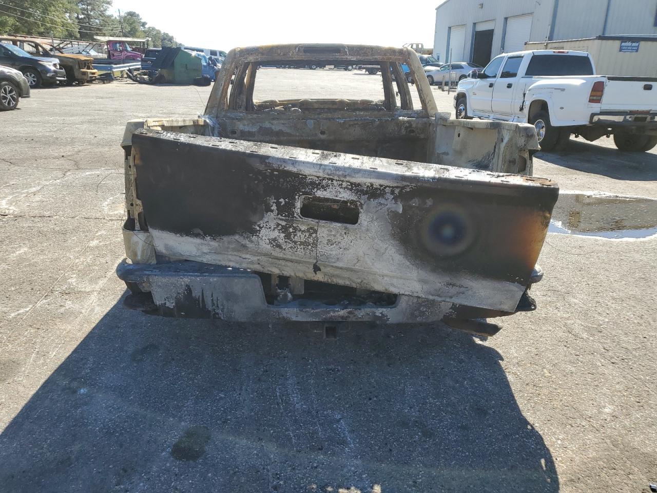 2018 Chevrolet Silverado VIN 3GCUKREC6JG453085 Copart auction photo, burn damage thumbnail 6