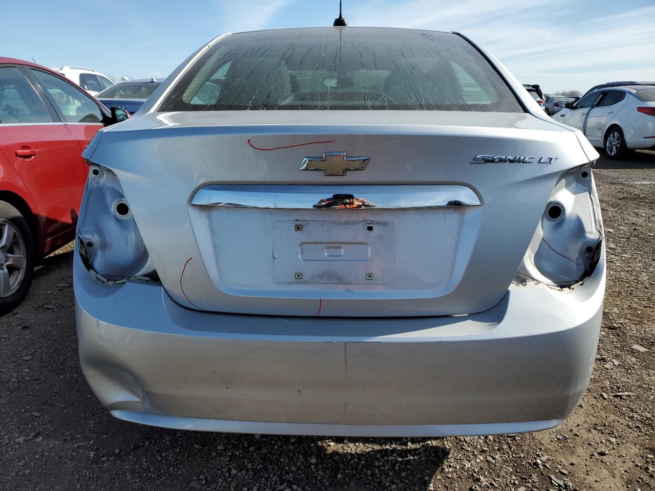 2015 Chevrolet Sonic VIN 1G1JC5SH8F4105651 Copart auction photo, rear end / minor dent/scratches damage thumbnail 6