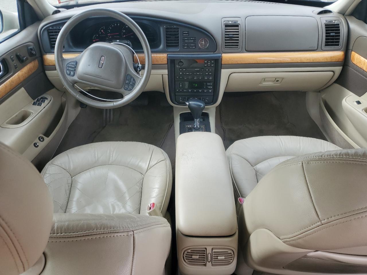 2001 Lincoln Continental VIN 1LNHM97V71Y711352 Copart auction photo, minor dent/scratches damage thumbnail 8
