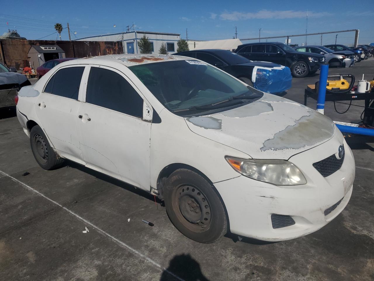 2010 Toyota Corolla VIN JTDBU4EE1AJ081563 Copart auction photo, side / stripped damage thumbnail 4